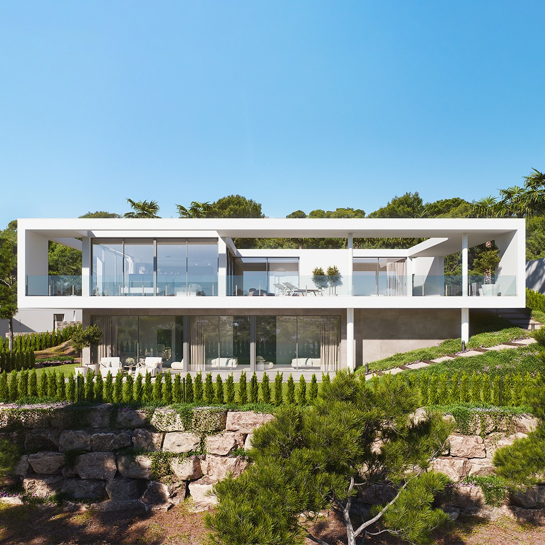 Moderne, minimalistisk villa med store glassflater som speiler den grønne naturen rundt.
